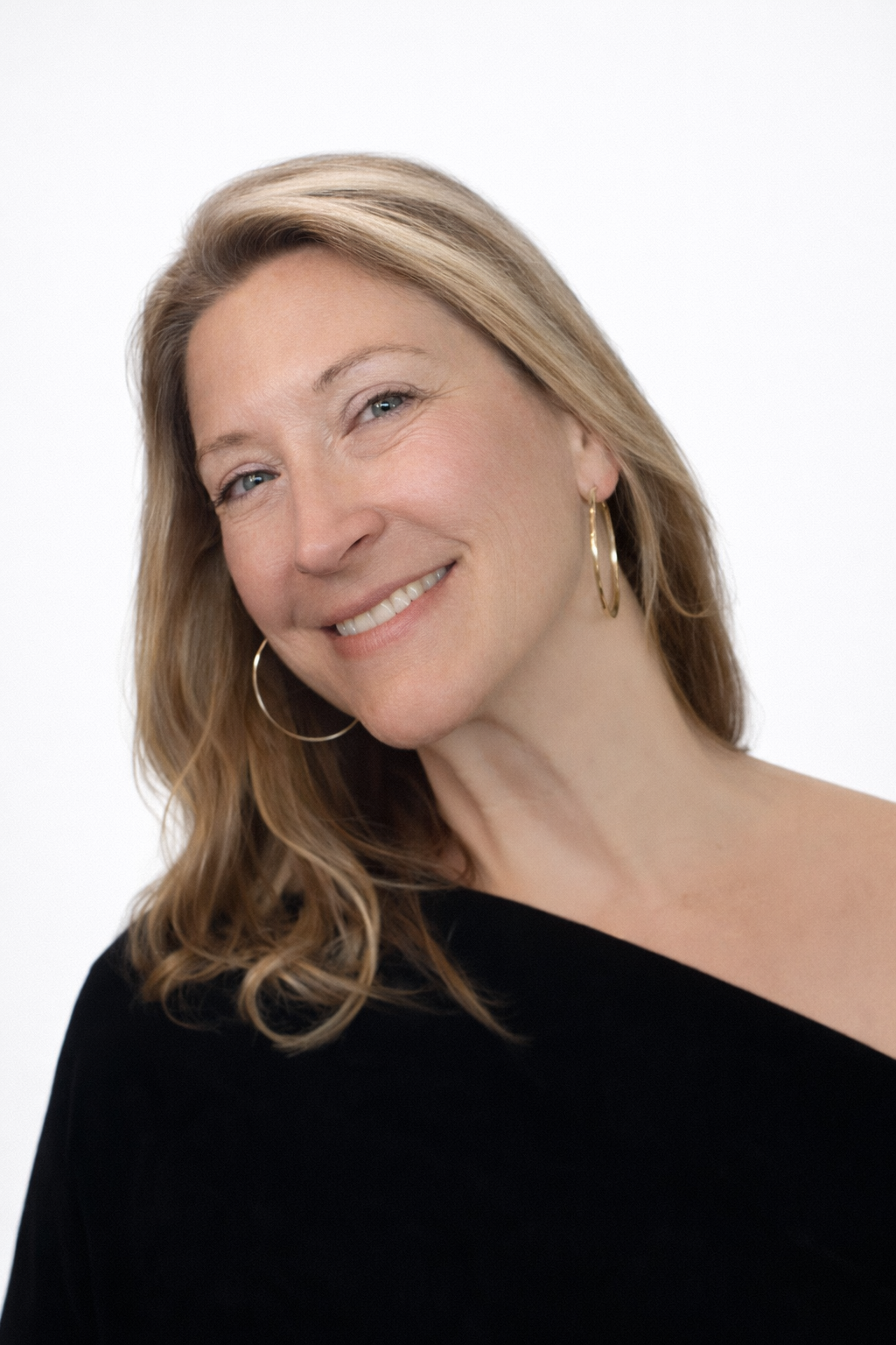 Laura K. Evak Speech Therapist headshot on white background